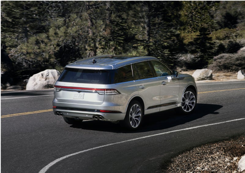 A Lincoln Aviator® is being driven on a winding road | Mike Reichenbach Lincoln in Florence SC