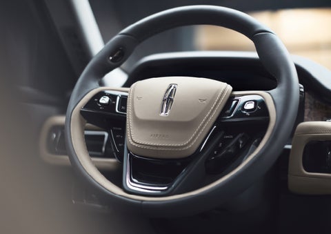 The intuitively placed controls of the steering wheel on a 2024 Lincoln Aviator® SUV | Mike Reichenbach Lincoln in Florence SC