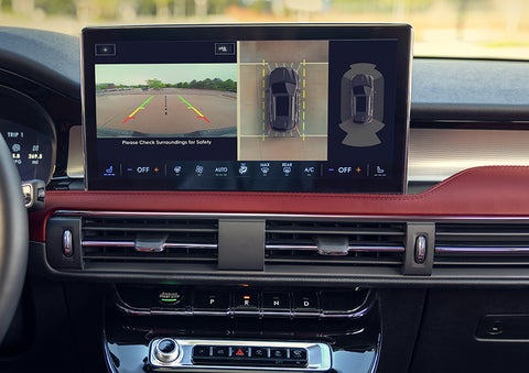 The driver of a 2024 Lincoln Corsair® SUV is shown selecting the drive mode. | Mike Reichenbach Lincoln in Florence SC